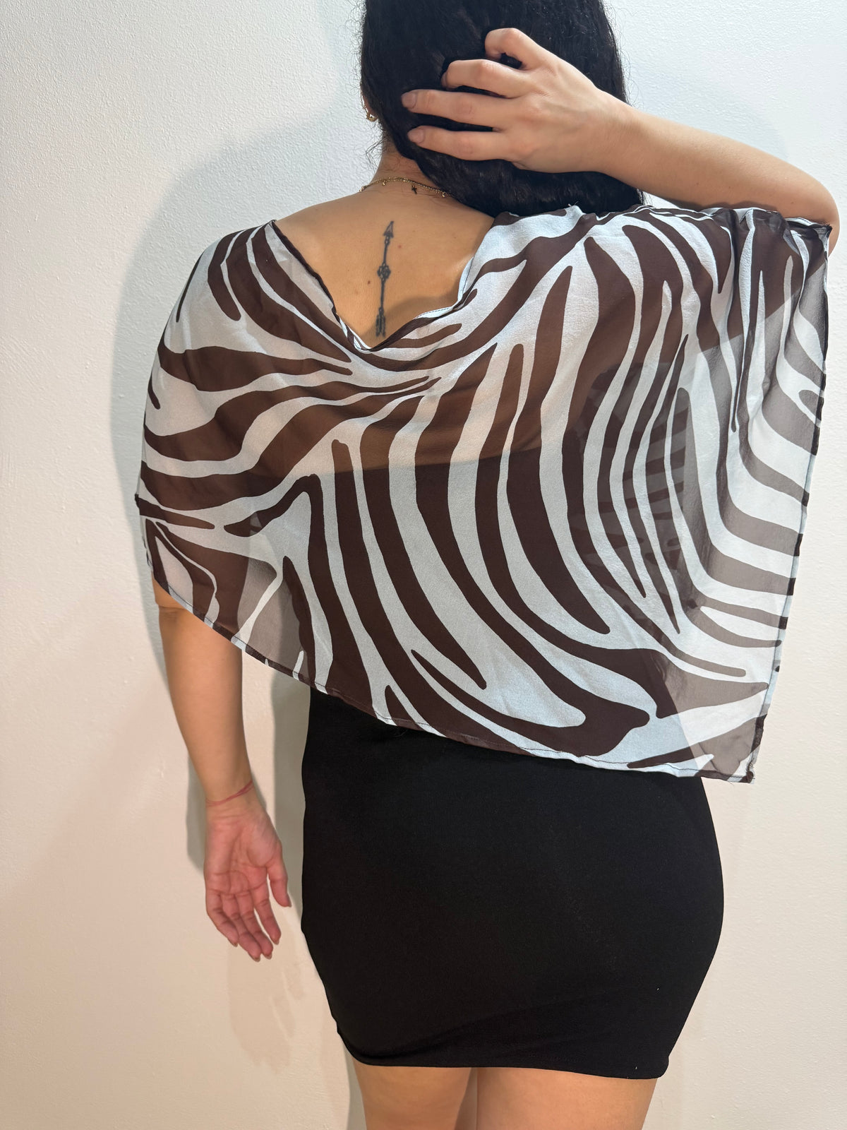 Sadie’s poncho - zebra