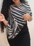 Sadie’s poncho - zebra